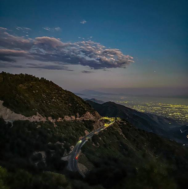 istock Highway Sunset on the side of a mountain 2170403447
