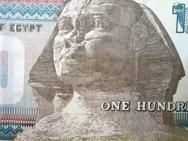 istock An Egyptian 100-pound banknote with ancient Egyptian pharaonic drawings and decorations, the head of the Sphinx, Egyptian economy, currency papers, banknote 2170404156