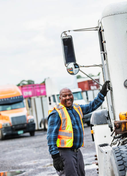 istock African-American truck driver smiling at camera 2170405823