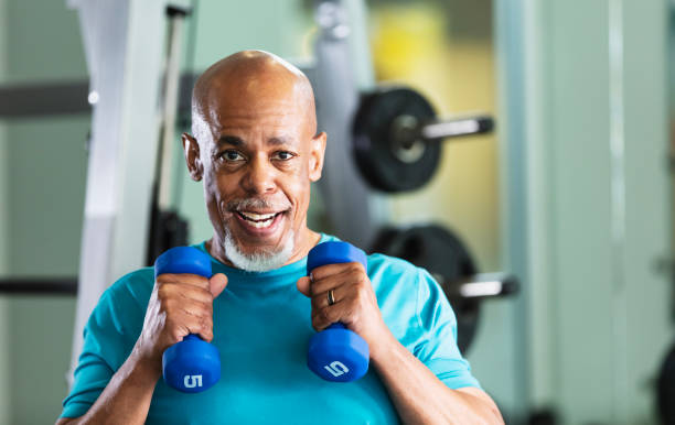 istock Senior African-American man working out at gym 2170407270