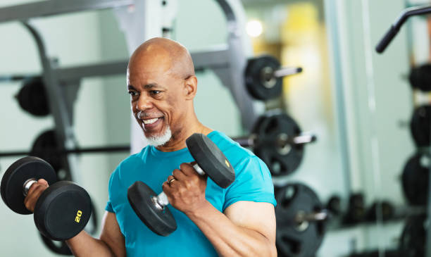 istock Senior African-American man working out at gym 2170407275