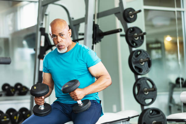 istock Senior African-American man working out at gym 2170407280