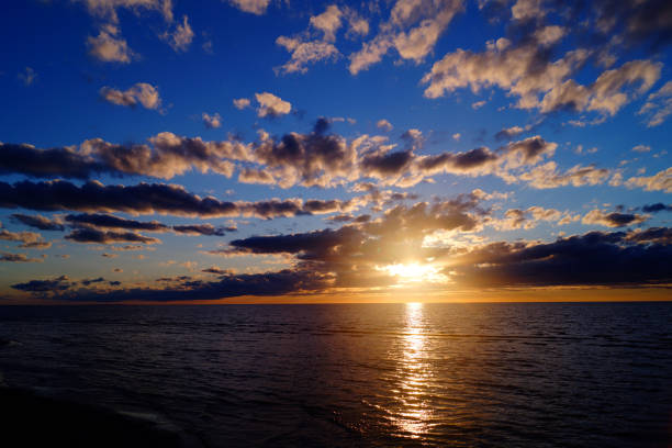 Sunset or sunrise landscape  with the sun and water. Eight picture.