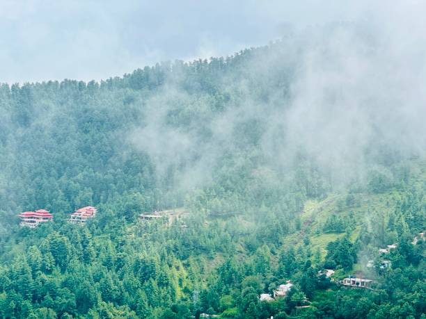 istock Stunning view of valley and mountains surrounded by clouds 2170411533