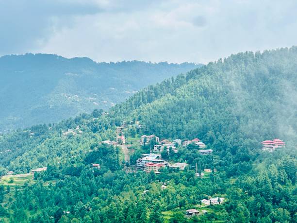 istock Stunning view of valley and mountains surrounded by clouds 2170411626