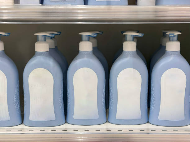 istock Elegant Lotion Bottles on a Store Shelf 2170412785