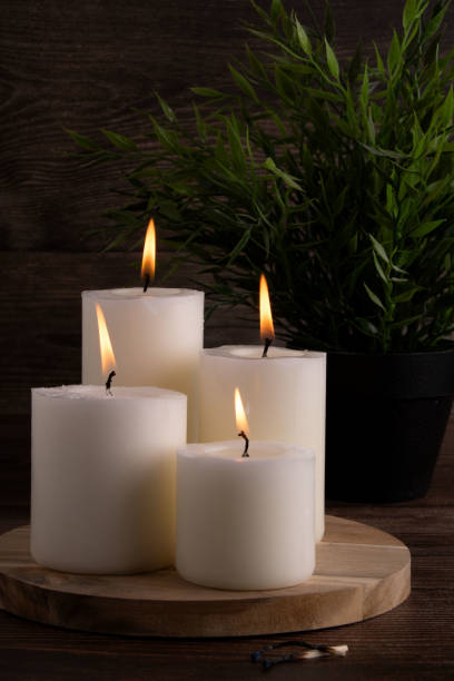 istock candle, candlelight, flame, burning, background, spa, decoration, relaxation, decor, closeup, aromatic, table, wax, home, light, photography, flower, aroma 2170414752