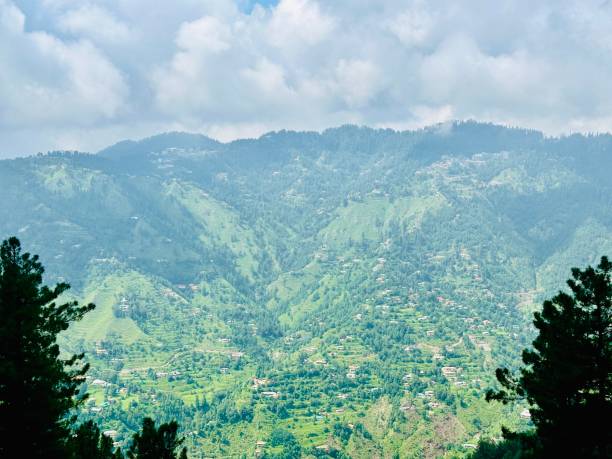 istock Stunning view of valley and mountains surrounded by clouds 2170414864