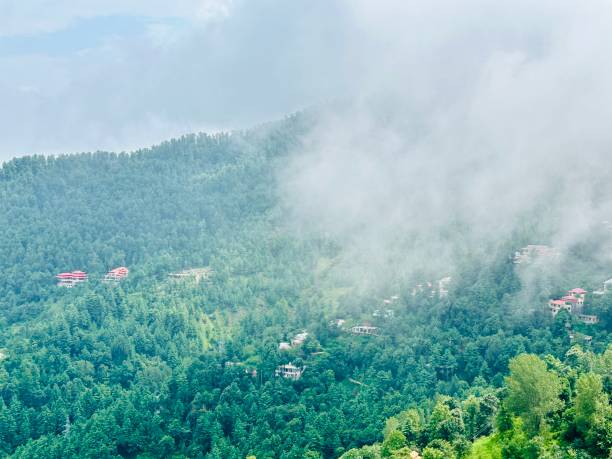 istock Stunning view of valley and mountains surrounded by clouds 2170415612