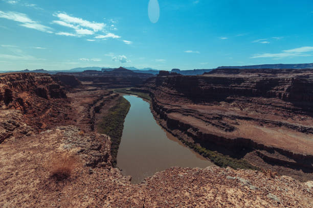 The famous offroad Shafer trail in the canyon near Moab, reaching Canyonland National park, Utah. View on the Colorado river