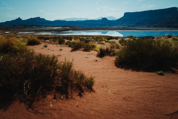 The famous offroad Shafer trail in the canyon near Moab, reaching Canyonland National park, Utah. Desert landscapes by the trail, by Potash Evaporation Ponds
