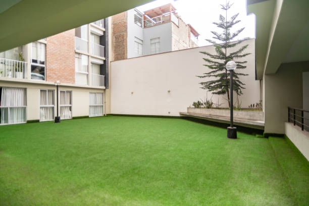 istock condominium courtyard with synthetic grass 2170431266