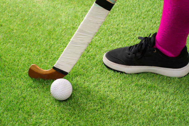 istock hockey player hitting the ball with the stick 2170431938