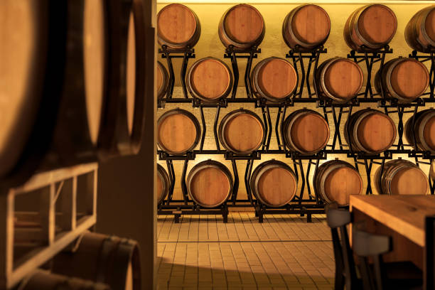 istock Wine wooden barrels in wine cellar 2170432813