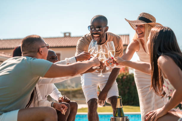 istock Diverse Friends with Champagne Villa Poolside 2170436945