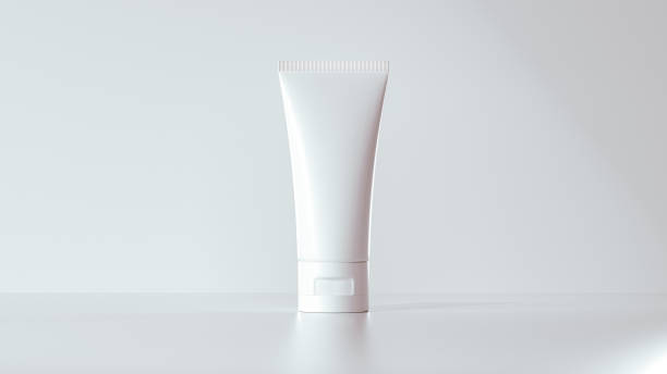 istock White cosmetic tube, minimalist design, soft lighting, neutral background, sleek packaging, skincare product, matte finish, studio shot, modern aesthetic, pale gray backdrop, crisp details, 3D render. 2170438746
