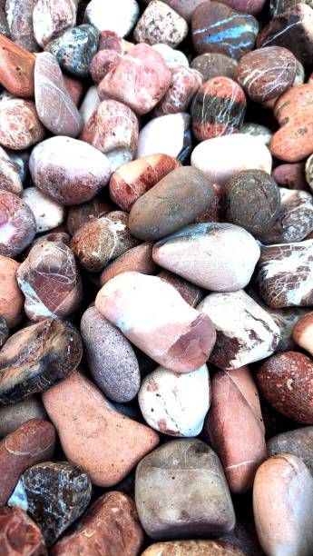istock Full frame shot of river pebbles 2170439125