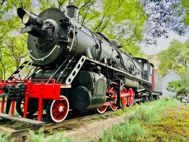 istock Vintage Coal Train Engine: Historical Steam Locomotive Standing Still 2170439371