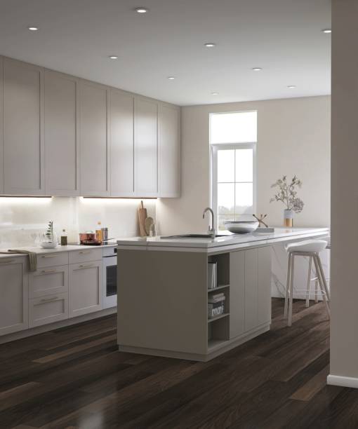 istock Modern, luxury kitchen with cream built in cabinet and cupboard, kitchen island on parquet floor in sunlight from window 2170444071