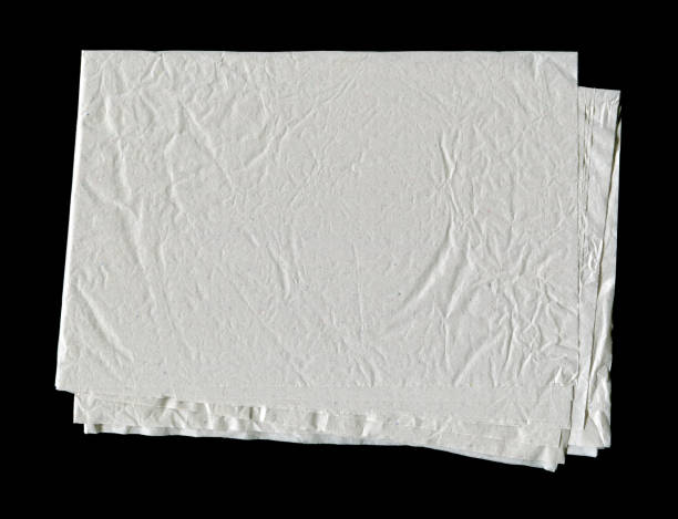 istock Wrinkled paper textured background isolated on white 2170445019