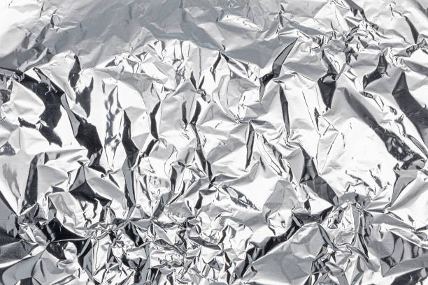 istock Crumpled aluminum foil background. realistic texture 2170445852