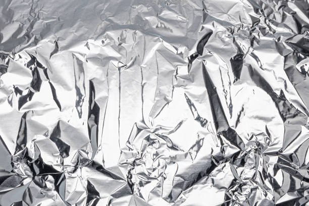 istock Crumpled aluminum foil background. realistic texture 2170445862