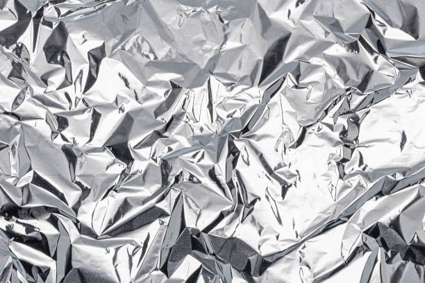 istock Crumpled aluminum foil background. realistic texture 2170445864