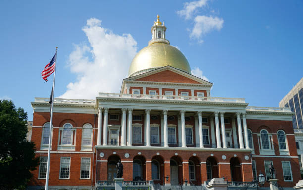 istock facade view of MA state house in sunny day 2170446095