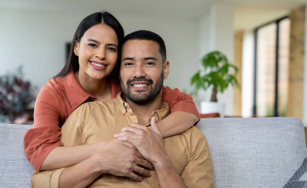 istock Loving couple smiling at home 2170446154