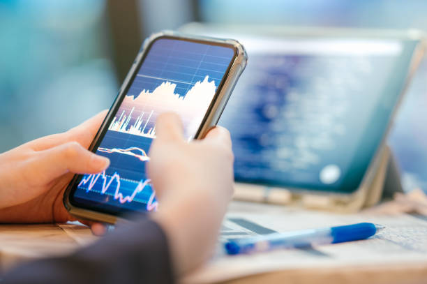 istock A woman using a tablet with an AI-enhanced finance chatbot for budgeting and expense tracking 2170454849