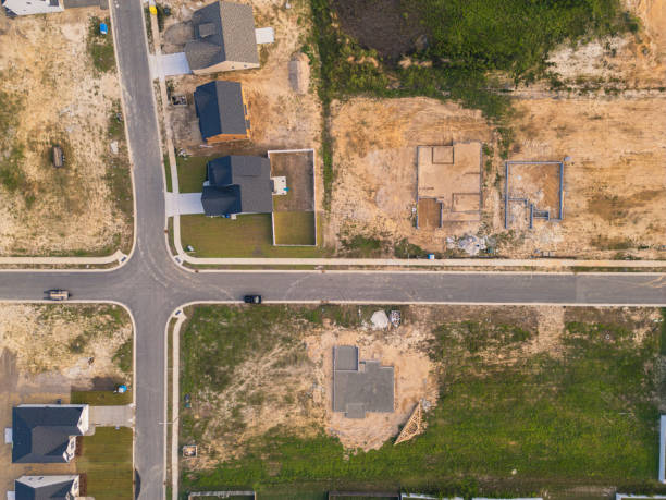 istock Cinder Blocks for Concrete Slab - New Homes Under Construction - High Angle Top Down 2170456520