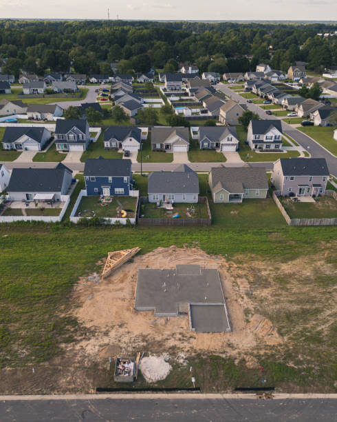 istock Concrete Slab - New Home Under Construction - Developing Neighborhood 2170456577