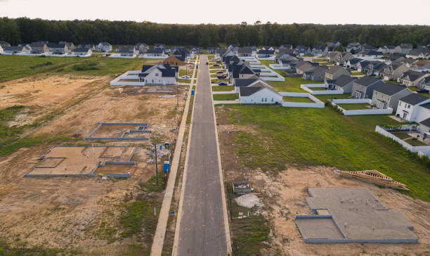 istock Concrete Slab Foundations - New Home Under Construction - Developing Neighborhood 2170456627