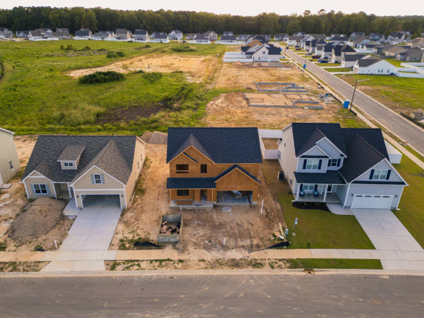 istock Homes Under Construction - Developing Neighborhood - Homes in a Line 2170456800