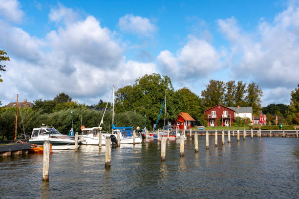 istock Tranquil Harbor Scene with Boats and Charming Waterfront Houses 2170456930