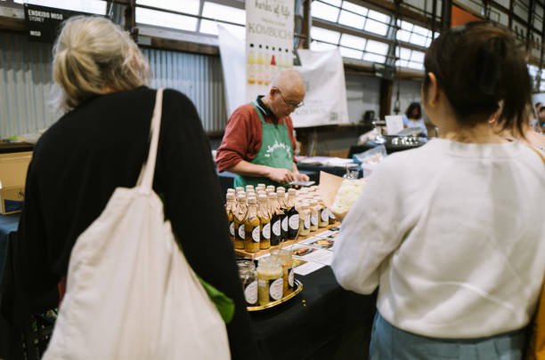 24th August 2024,Sydney Australia: Locals buying fresh foods and drinks at a weekend farmer market at Carriage Works in Sydney. Carriageworks is one of Australia’s most renowned and significant contemporary multi-arts organisations. We support artists and producers to develop and present major new works in performance, visual arts and related artforms. Reflecting the diverse communities of urban Sydney, our artist-led program is ambitious, radical and always inclusive.Carriageworks Farmers Market provides the freshest seasonal produce every Sat from 8am – 1pm.
