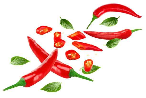 istock flying sliced green hot chili peppers isolated on white background clipping path 2170462875