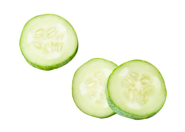 istock Top view set of fresh green cucumber slices in circle shape in stack isolated on white background with clipping path 2170464619