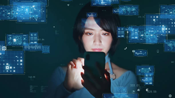 istock Young asian woman watching hologram screens. 2170467809