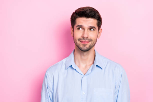 istock Portrait of handsome minded gentleman looking empty space interesting proposition sale discount isolated on pink color background 2170473605