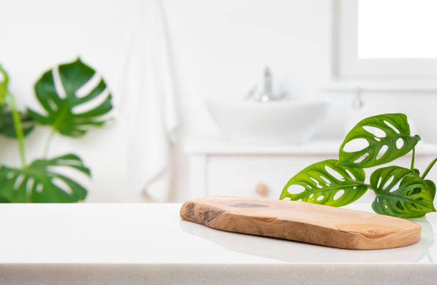istock Wooden podium on table on blur bathroom background for bathing and spa product display 2170473801