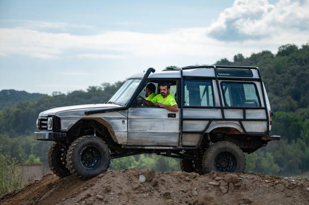 Sant Celoni, Spain – August 17, 2024: off-roader, first generation Land Rover Discovery Series 1 modified for extreme off-road climbing obstacles in the countryside