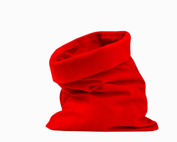 Red textile santa bag  isolated on white nobody. Christmas decor single object.