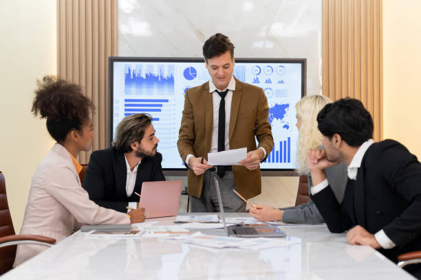 istock Professional smart business team discussion about start up project. Ornamented. 2170479001