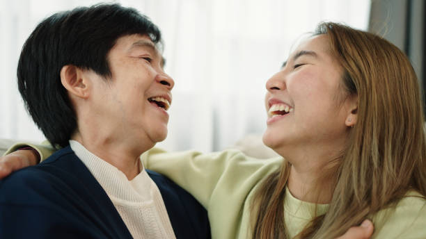 istock Mother and daughter hugging and kissing. 2170479810