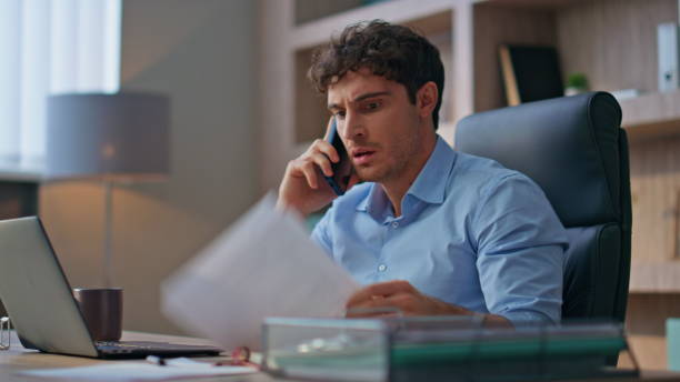 istock Dissatisfied ceo talking cell discussing contract closeup. Nervous man arguing 2170483478