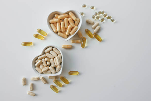 istock Tablets and vitamins on white background, banner advertising, pharmaceuticals 2170484855