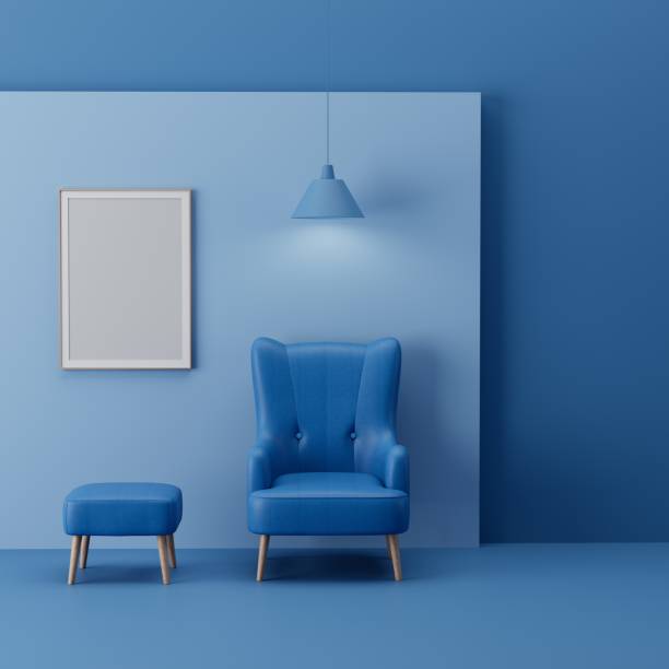Blue ambient light shines across a dark surface, casting abstract shadows and creating a texture