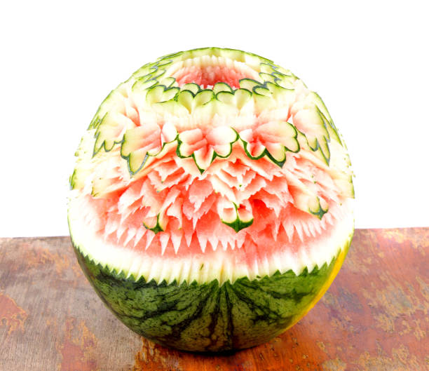 istock watermelon carved(Thai pattern) on wooden table 2170488916