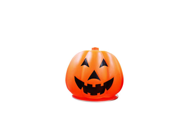 istock Halloween carved pumpkin lantern with smile  white background. 2170489063